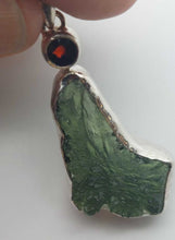 Load image into Gallery viewer, Moldavite Pendant w/Garnet  925  Bezel Set w/Certificate of Authenticity 6.1gr
