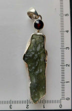 Load image into Gallery viewer, Moldavite Pendant w/Garnet  925  Bezel Set w/Certificate of Authenticity 6.7gr
