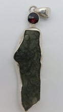 Load image into Gallery viewer, Moldavite Pendant w/Garnet  925  Bezel Set w/Certificate of Authenticity 6.7gr
