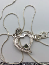 Load image into Gallery viewer, Moldavite Pendant 6mm Round Faceted Gem set in 925 Silver Heart Shape with COA
