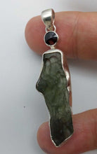 Load image into Gallery viewer, Moldavite Pendant w/Garnet  925  Bezel Set w/Certificate of Authenticity 6.7gr
