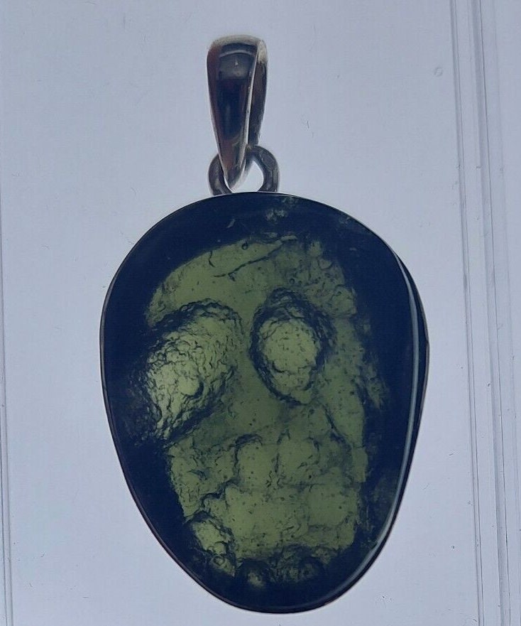 Moldavite cabachon  pendant  bezel set 44.5 ct with certificate of authenticity