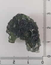 Load image into Gallery viewer, Moldavite 7.13 grams 35.65ct Grade A with Certificate of Authenticity
