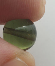 Load image into Gallery viewer, Moldavite bead 8mm .64gr/3.30ct jewelry grade with coa authentic rare item
