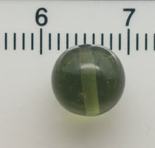 Load image into Gallery viewer, Moldavite bead 8mm .64gr/3.30ct jewelry grade with coa authentic rare item
