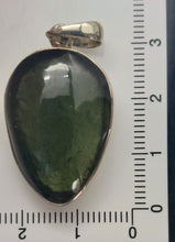 Load image into Gallery viewer, Moldavite cabachon  pendant  bezel set 36.25 ct with certificate of authenticity
