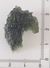 Load image into Gallery viewer, Moldavite 7.13 grams 35.65ct Grade A with Certificate of Authenticity
