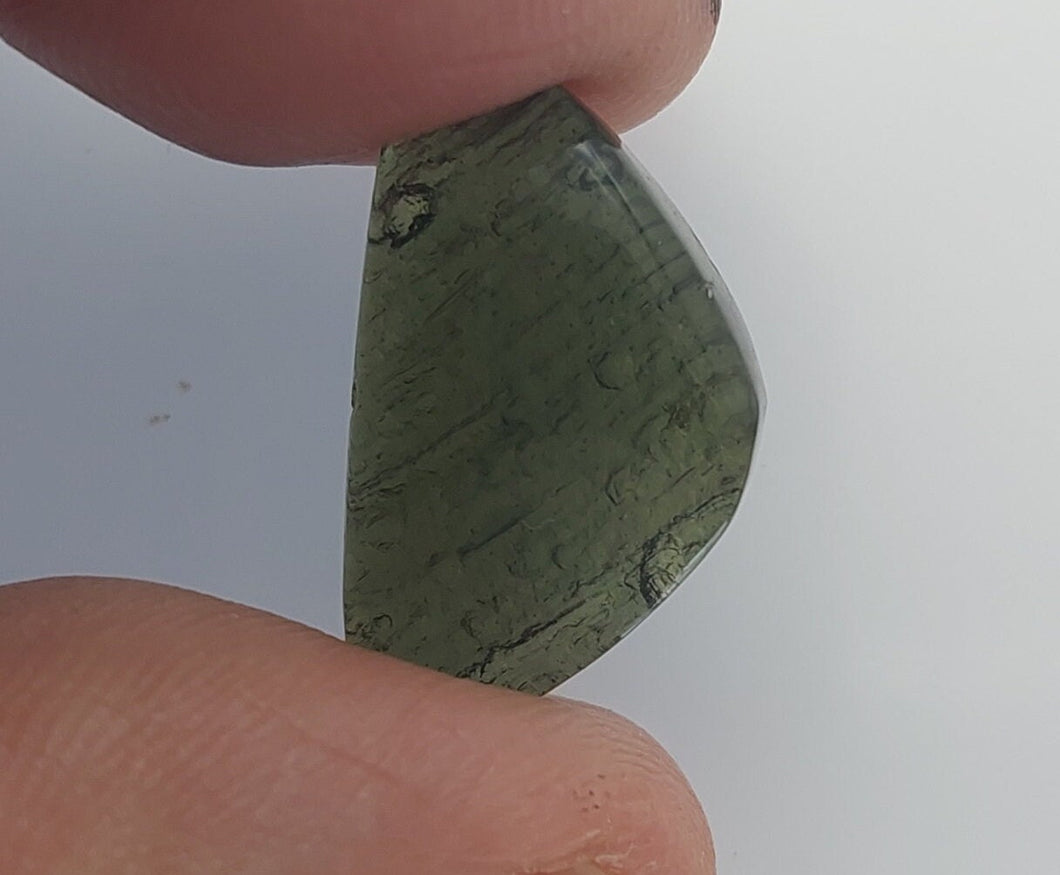 Moldavite cabochon polished/raw sides 2.17gr/10.85ct certificate of authenticity