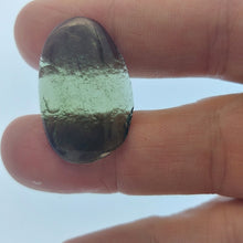 Load image into Gallery viewer, Moldavite cabochon polished/raw sides 3.32gr/16.6ct certificate of authenticity
