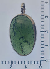 Load image into Gallery viewer, Moldavite Cabochon Pendant Bezel Set -- 7.2grams/36.0ct - Polished-Raw sides    Certificate of Authenticity
