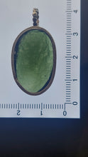 Load image into Gallery viewer, Moldavite Cabochon Pendant Bezel Set -- 7.2grams/36.0ct - Polished-Raw sides    Certificate of Authenticity
