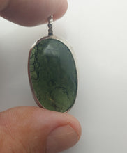 Load image into Gallery viewer, Moldavite Cabochon Pendant Bezel Set -- 7.2grams/36.0ct - Polished-Raw sides    Certificate of Authenticity
