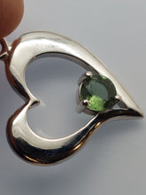 Load image into Gallery viewer, Moldavite Pendant 6mm Round Faceted Gem set in 925 Silver Heart Shape with COA
